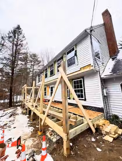 Rear home addition framing on colonial house