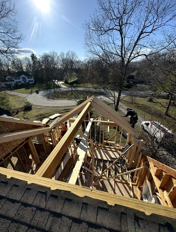 Rafters framed over an existing home during an addition